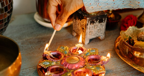 Man setting out decorations for Dashain celebrations